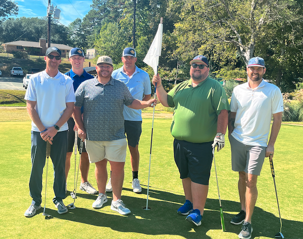 texas heritage national bank team on golf course