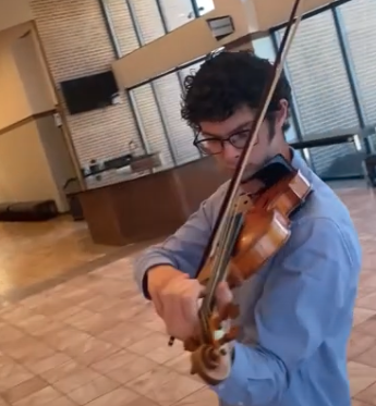andre Daniel playing violin