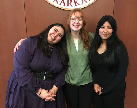 three girls at conference