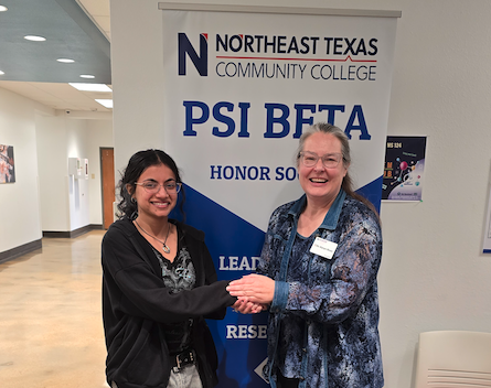 patel receiving scholarship