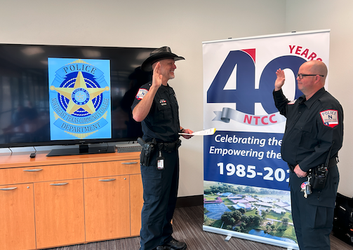 Weisinger being sworn in