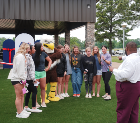students at ribbon cutting