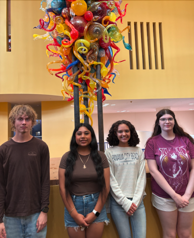 group with Chihuly glass sculpture