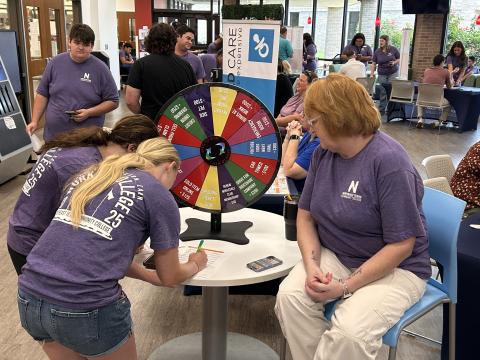student spinning wheel