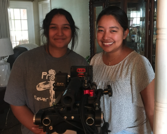 two girls filming