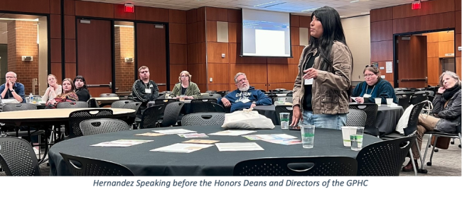 student speaking to group