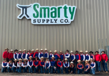 rodeo team in front of Smarty building