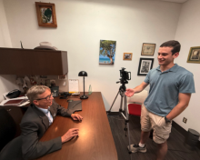student interviewing Dr. Yox