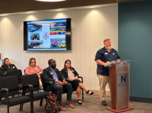 Austin Maness addresses board