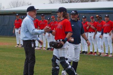 clinton with baseball team