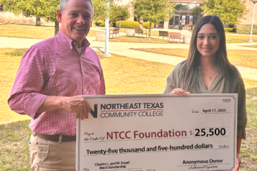 black scholarship check presentation