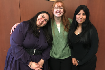 three girls at conference