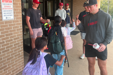 baseball greeting kids
