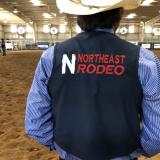 rodeo athlete wearing logo vest