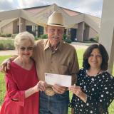 Fosters give check to Nita May