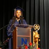 Courtney Baldwin speaking at graduation