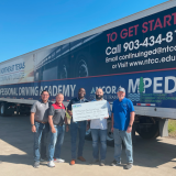 check presentation in front of truck