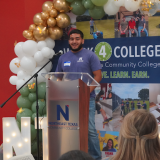 Juan speaking
